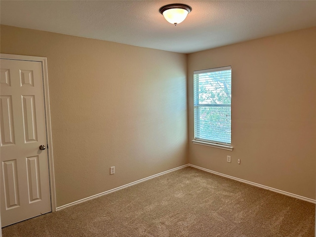2717 Big Spring Dr, Fort Worth, TX 76120 - unfurnished room with carpet floors and baseboards