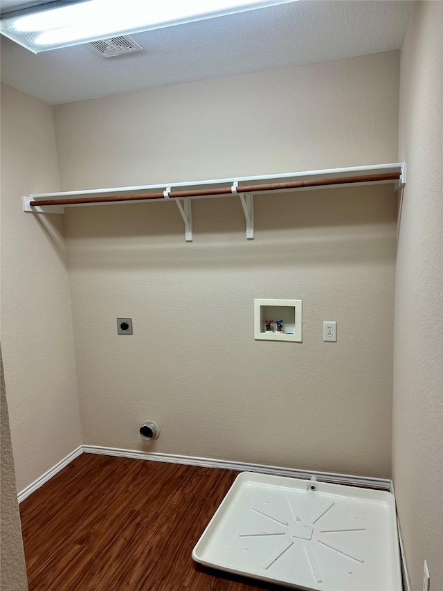 2717 Big Spring Dr, Fort Worth, TX 76120 - washroom with wood finished floors, washer hookup, and electric dryer hookup