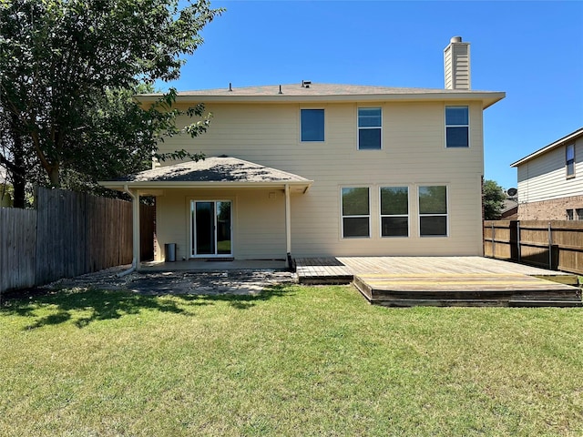2717 Big Spring Dr, Fort Worth, TX 76120 - rear view of property with a fenced backyard, a chimney, and a wooden deck