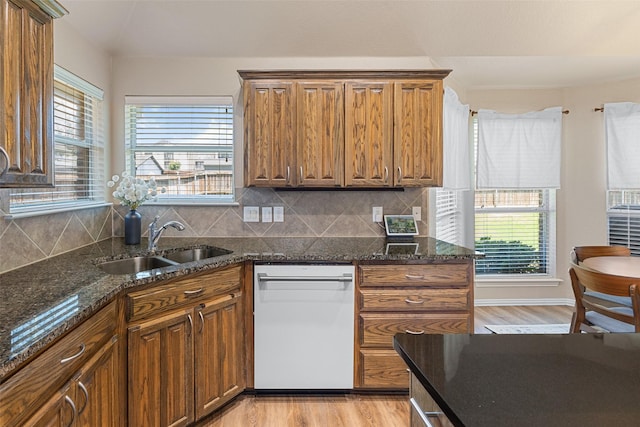 5520 Plata Ln, Benbrook, TX 76126 - kitchen with white dishwasher, light wood-style flooring, and plenty of natural light