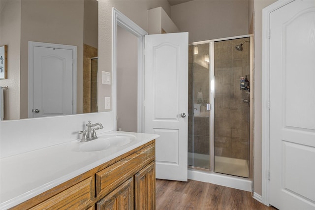 5520 Plata Ln, Benbrook, TX 76126 - full bath with a stall shower, vanity, and wood finished floors