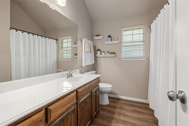 5520 Plata Ln, Benbrook, TX 76126 - bathroom with vaulted ceiling, vanity, and wood finished floors