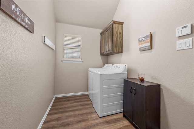 5520 Plata Ln, Benbrook, TX 76126 - laundry room with washer and clothes dryer, cabinet space, and dark wood-style flooring