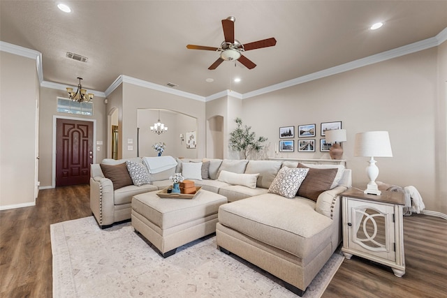 5520 Plata Ln, Benbrook, TX 76126 - living room with a chandelier, arched walkways, a ceiling fan, wood finished floors, and recessed lighting
