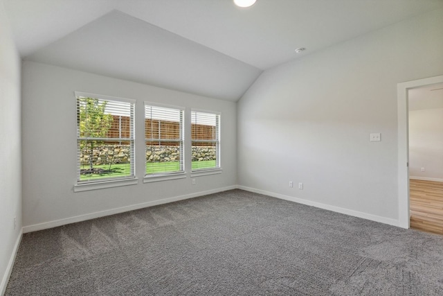 264 Bright Alcove Ct, Lavon, TX 75166 - carpeted spare room featuring vaulted ceiling and baseboards