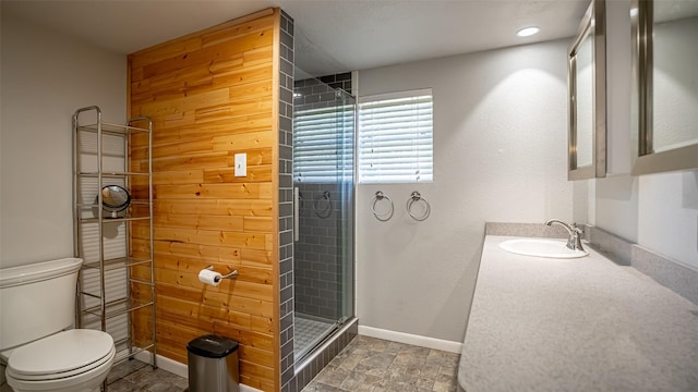 1250 N Isla St, Stephenville, TX 76401 - full bath with a shower stall, vanity, wooden walls, and recessed lighting