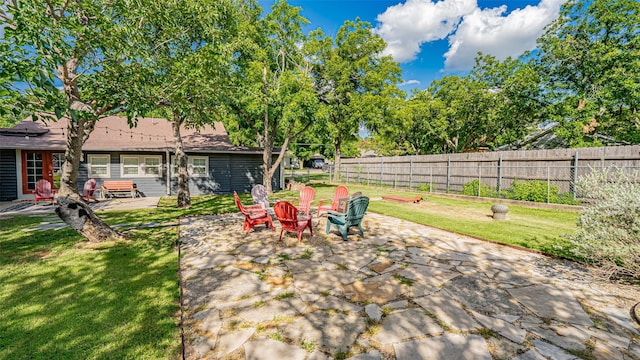 1250 N Isla St, Stephenville, TX 76401 - view of yard featuring a patio and a fire pit