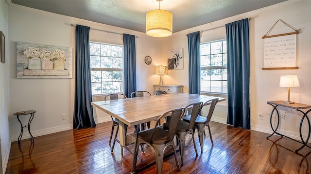1250 N Isla St, Stephenville, TX 76401 - dining room featuring dark wood-type flooring and ornamental molding