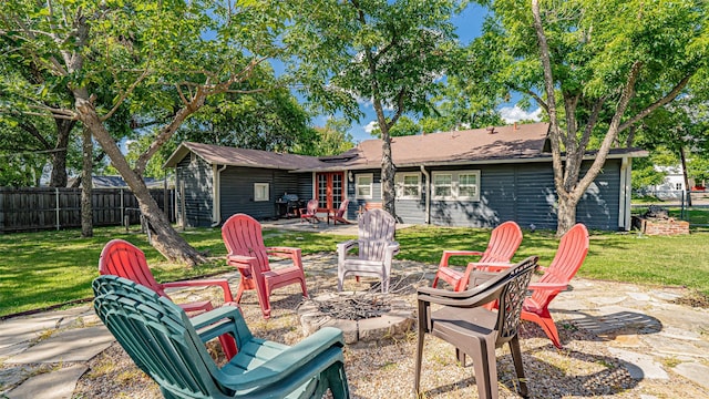 1250 N Isla St, Stephenville, TX 76401 - rear view of house featuring a fire pit and a patio