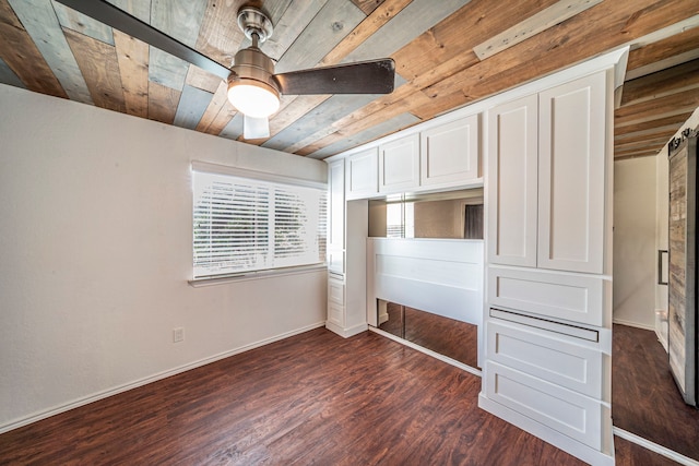 1704 Baird Farm Cir Unit 4104, Arlington, TX 76006 - unfurnished bedroom with wood ceiling, dark wood-style floors, and a ceiling fan