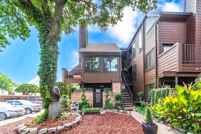 1704 Baird Farm Cir Unit 4104, Arlington, TX 76006 - view of building exterior featuring stairway