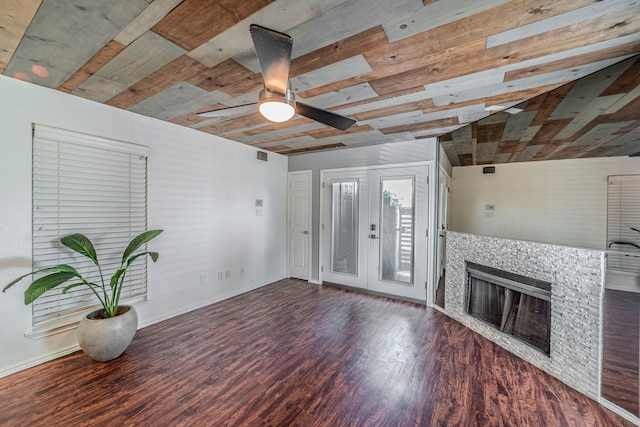 1704 Baird Farm Cir Unit 4104, Arlington, TX 76006 - unfurnished living room with wood finished floors, ceiling fan, and a tile fireplace