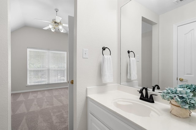 2309 Chambray Dr, Corinth, TX 76210 - bathroom with vanity, a ceiling fan, and vaulted ceiling