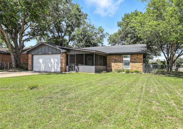 800 Madison St, Cleburne, TX 76033 - ranch-style house with a garage, brick siding, driveway, and a sunroom