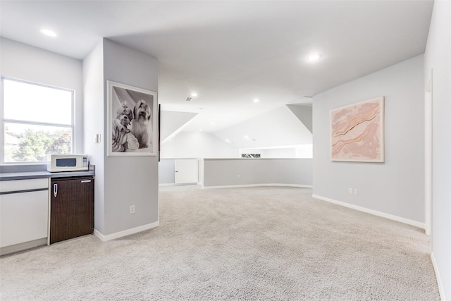 17503 Torrey Pine Dr, Dallas, TX 75287 - unfurnished living room featuring light colored carpet, recessed lighting, and vaulted ceiling