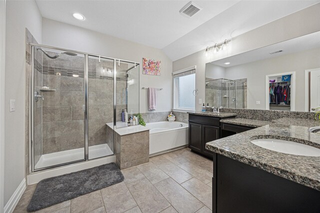 933 Basket Willow Ter, Fort Worth, TX 76052 - full bathroom with a shower stall, two vanities, a garden tub, a walk in closet, and recessed lighting