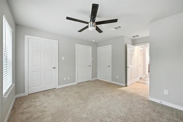 324 W Munson St Unit 326, Denison, TX 75020 - unfurnished bedroom featuring carpet flooring and a ceiling fan
