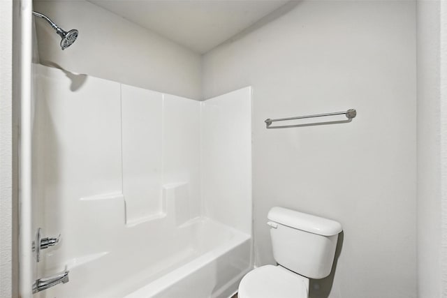 324 W Munson St Unit 326, Denison, TX 75020 - bathroom with toilet and bathing tub / shower combination