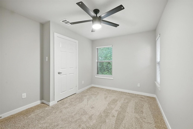 324 W Munson St Unit 326, Denison, TX 75020 - unfurnished room featuring ceiling fan and carpet