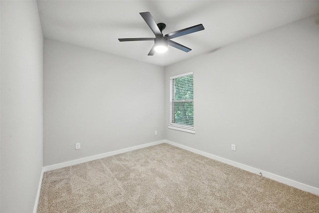 324 W Munson St Unit 326, Denison, TX 75020 - carpeted empty room featuring baseboards and a ceiling fan