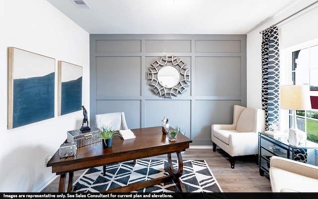 2013 Placerville St, Forney, TX 75126 - home office featuring a decorative wall and light wood-style flooring