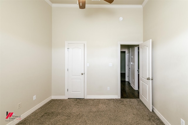 1859 Sparrow Rdg, Haughton, LA 71037 - unfurnished bedroom with crown molding, carpet, and a towering ceiling