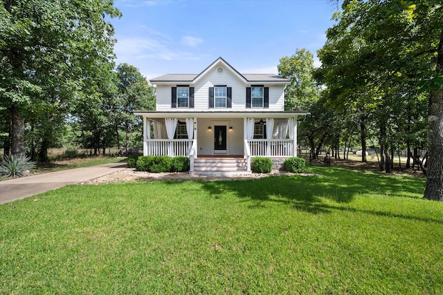 7720 Angelina Dr, Athens, TX 75752 - view of front of home featuring a porch, driveway, and a front lawn