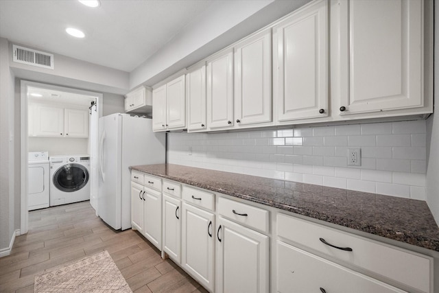 7720 Angelina Dr, Athens, TX 75752 - washroom featuring independent washer and dryer, light wood-style floors, and recessed lighting