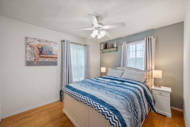 7720 Angelina Dr, Athens, TX 75752 - bedroom featuring light wood-type flooring and a ceiling fan