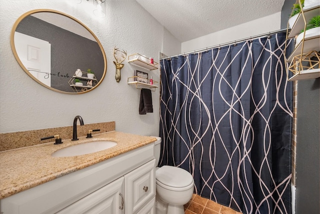 7720 Angelina Dr, Athens, TX 75752 - bathroom with vanity, a textured ceiling, a shower with shower curtain, a textured wall, and tile patterned floors