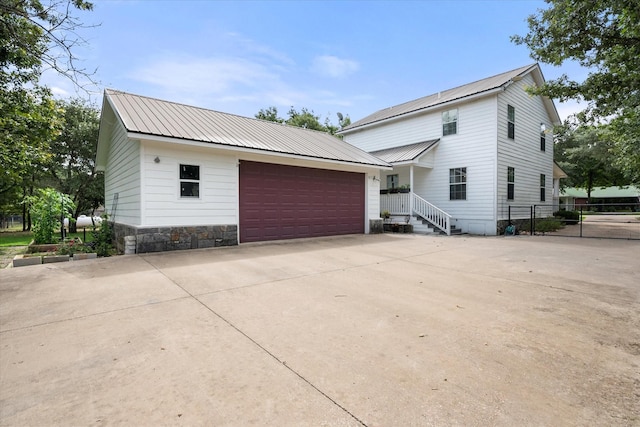 7720 Angelina Dr, Athens, TX 75752 - view of front of property with a metal roof and stone siding