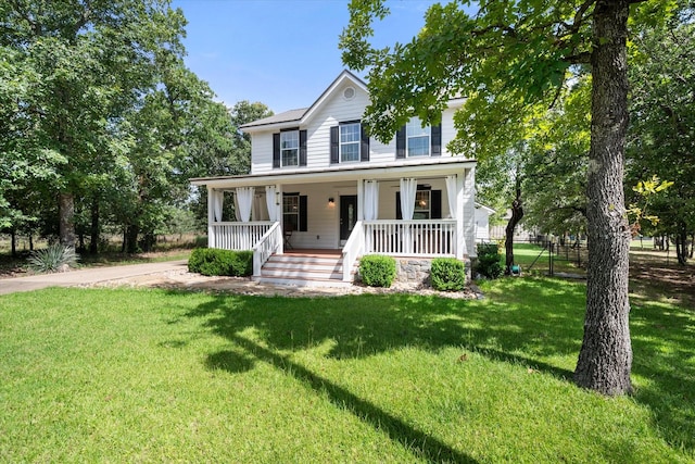 7720 Angelina Dr, Athens, TX 75752 - view of front facade with covered porch and a front lawn
