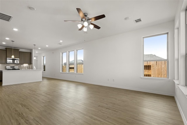 469 Silent Pond, Lavon, TX 75166 - unfurnished living room featuring light wood-style flooring, recessed lighting, and ceiling fan