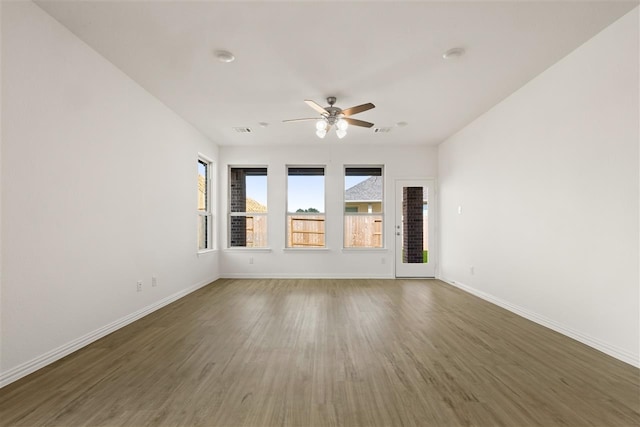 469 Silent Pond, Lavon, TX 75166 - empty room featuring wood finished floors and a ceiling fan