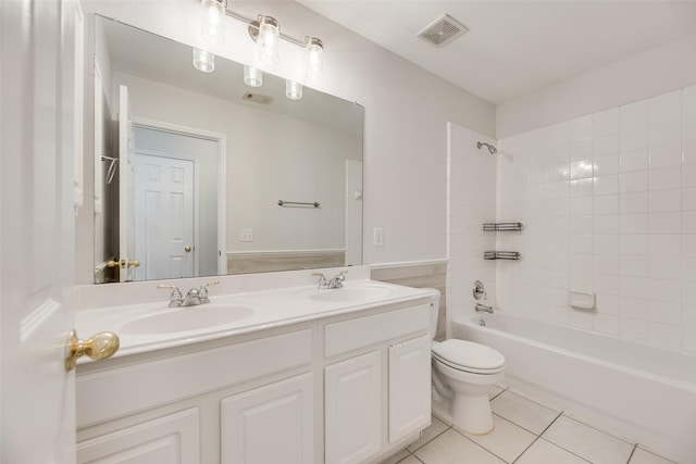 1647 Ash Ln, Corinth, TX 76210 - bathroom featuring double vanity, tile patterned flooring, and washtub / shower combination