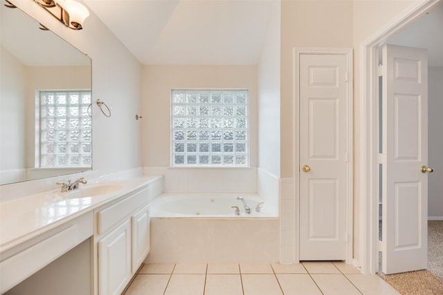 1647 Ash Ln, Corinth, TX 76210 - full bathroom with a garden tub, vanity, and tile patterned flooring