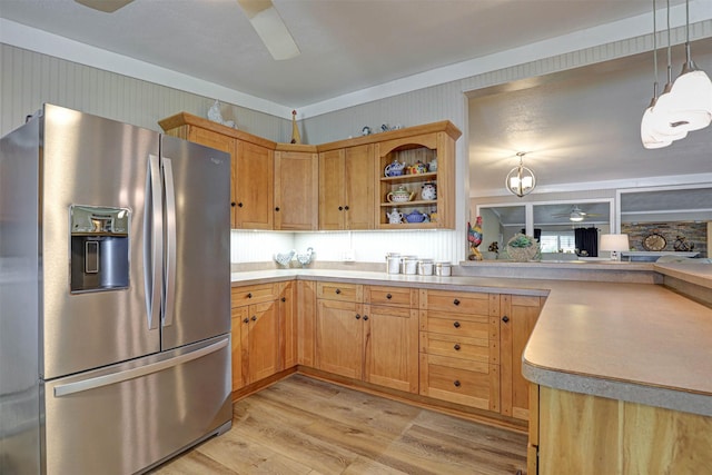 4018 Linda Ct, Granbury, TX 76048 - kitchen featuring stainless steel fridge, light wood-style floors, light countertops, hanging light fixtures, and open shelves