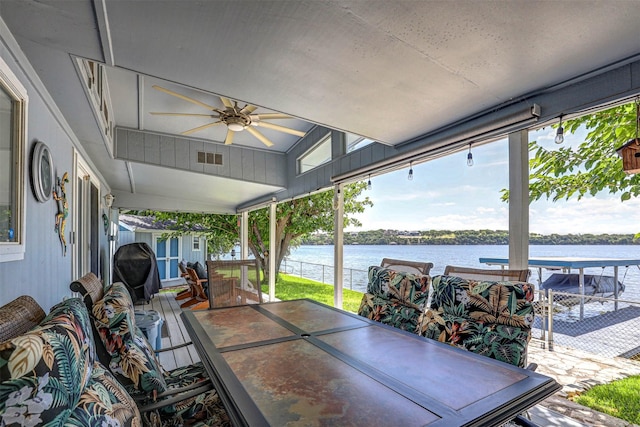 4018 Linda Ct, Granbury, TX 76048 - view of patio with a water view, a ceiling fan, and a storage unit
