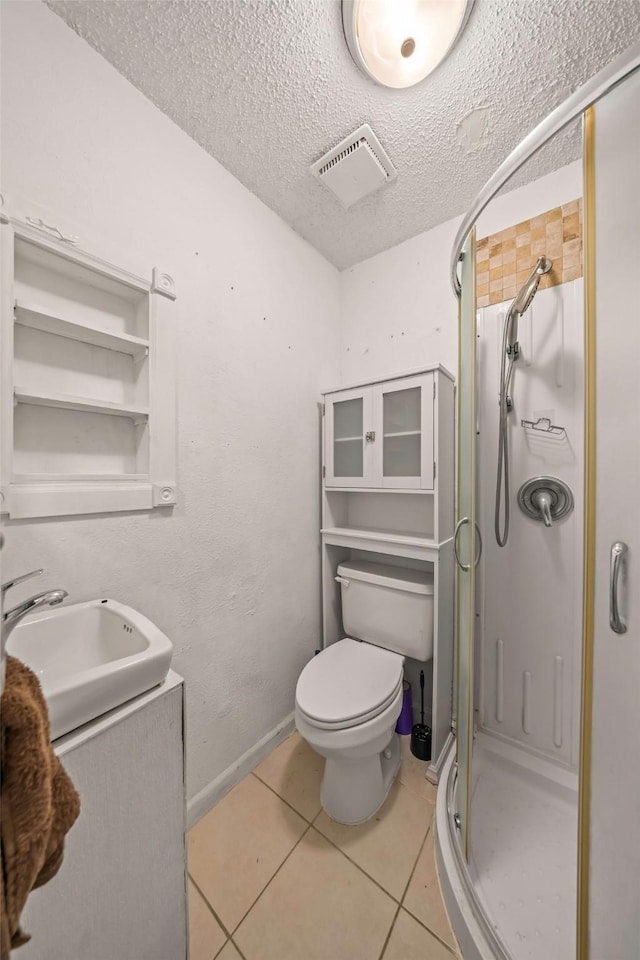 101 Arrowhead St, Fort Worth, TX 76108 - full bathroom featuring a stall shower, tile patterned floors, vanity, and a textured ceiling