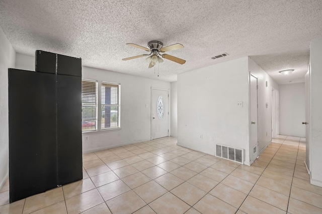 101 Arrowhead St, Fort Worth, TX 76108 - entryway with ceiling fan, a textured ceiling, and light tile patterned floors
