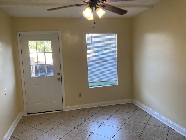 376 Valley Park Dr, Garland, TX 75043 - doorway to outside featuring ceiling fan and light tile patterned floors