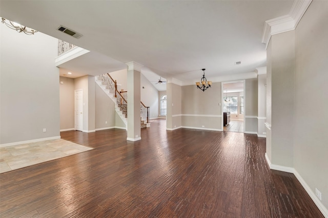 4105 Williams Ct, Grapevine, TX 76051 - unfurnished living room with a chandelier, stairs, wood finished floors, and ornamental molding