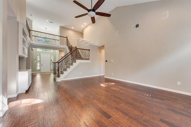 4105 Williams Ct, Grapevine, TX 76051 - unfurnished living room featuring high vaulted ceiling, stairs, a ceiling fan, wood finished floors, and recessed lighting