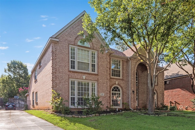 4105 Williams Ct, Grapevine, TX 76051 - colonial house with brick siding and a front yard