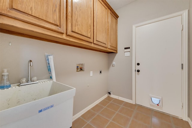 4105 Williams Ct, Grapevine, TX 76051 - laundry area with cabinet space, washer hookup, electric dryer hookup, and light tile patterned floors