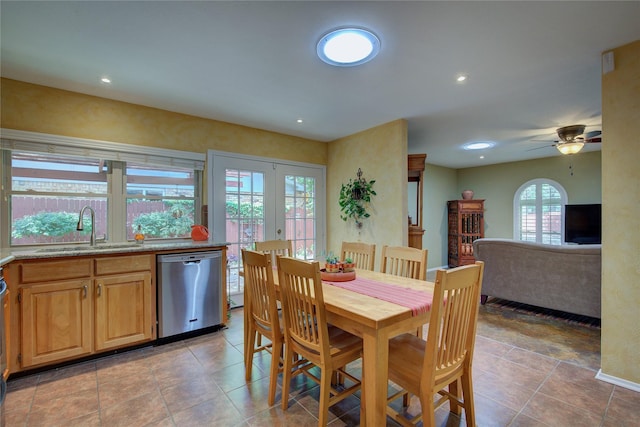 5610 Christie Ln, Garland, TX 75044 - dining room featuring french doors, a ceiling fan, recessed lighting, and light tile patterned floors