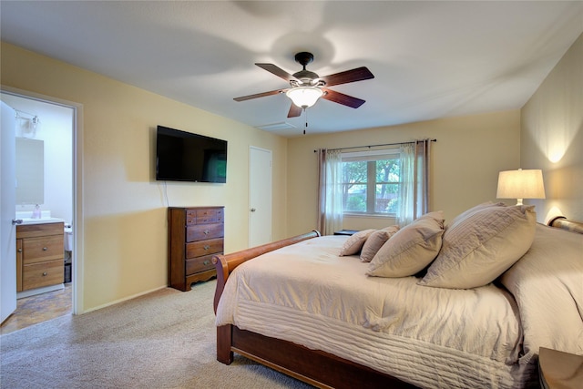 5610 Christie Ln, Garland, TX 75044 - bedroom featuring light carpet and a ceiling fan