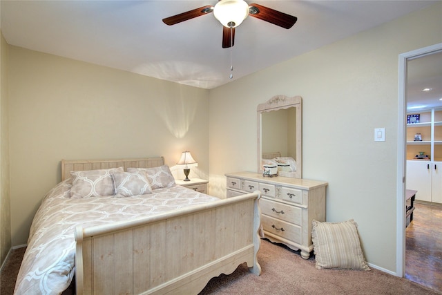 5610 Christie Ln, Garland, TX 75044 - carpeted bedroom with baseboards and ceiling fan