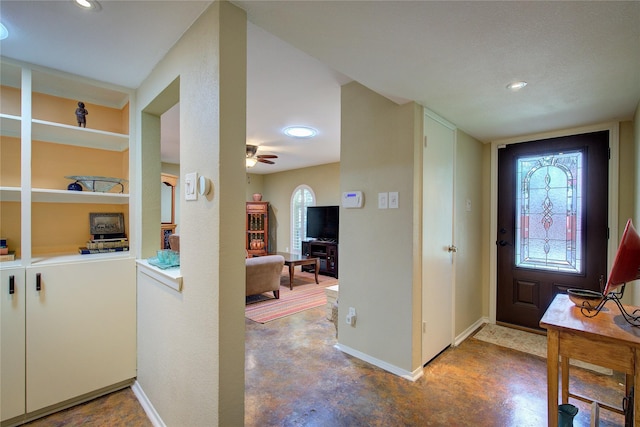 5610 Christie Ln, Garland, TX 75044 - foyer entrance with finished concrete flooring, recessed lighting, and ceiling fan