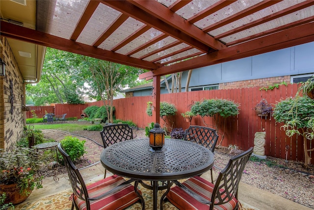 5610 Christie Ln, Garland, TX 75044 - fenced backyard with outdoor dining space, a patio area, and a pergola